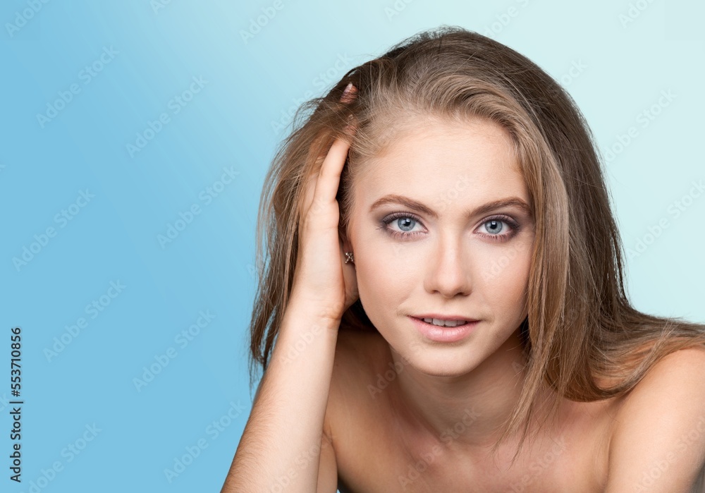 Happy young woman model posing