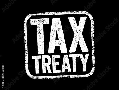 Tax Treaty - bilateral agreement made by two countries to resolve issues involving double taxation, text stamp concept background