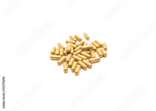 Top view mound of horny goat weed extract in easy to swallow capsules isolated on white background