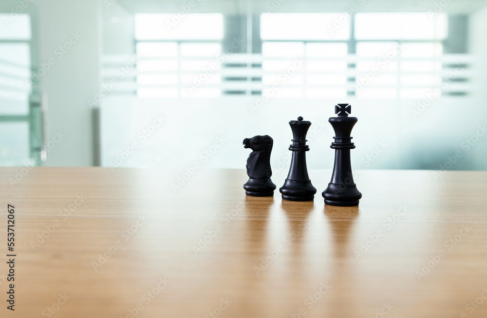 Three chess pieces on the table Three chess pieces on the table