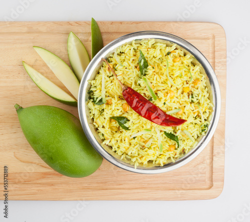 Indian vegetarian food mango rice and raw mango known as  Totapuri. Raw Mango Rice a south Indian variety of rice photo