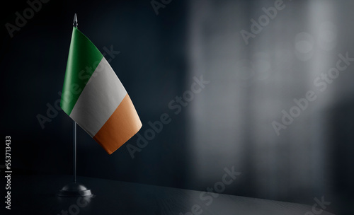 Fotografie Small national flag of the Ireland on a black background