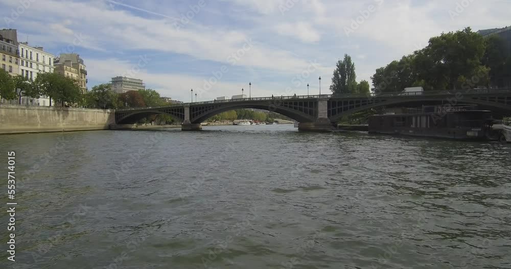 Bateau-mouche heading to the Pont de Sully in Paris Bateau-mouche heading to the Pont de Sully in Paris