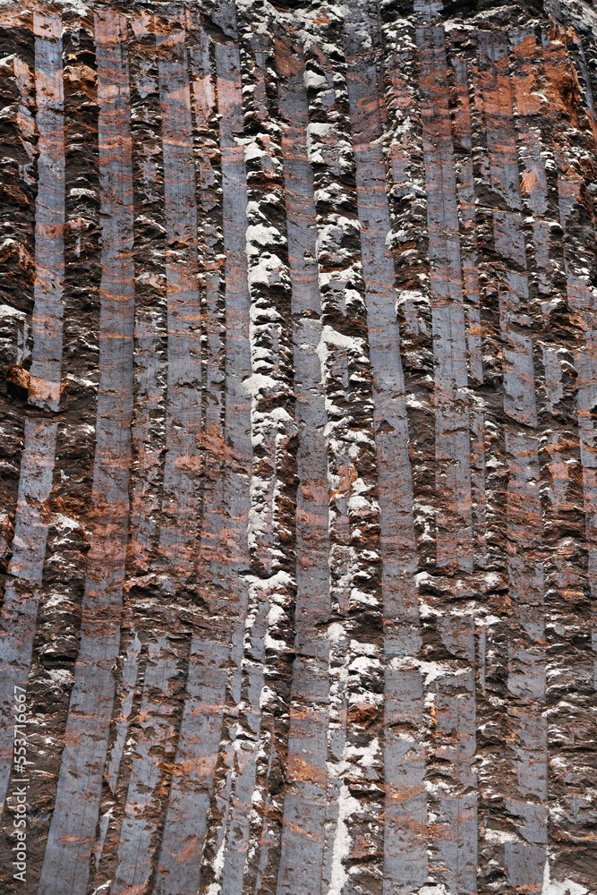 Obraz premium Interesting traces on coal made by the excavator during its operation. Visible result of excavator digging. 