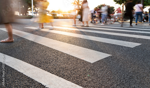 Group of people walking on the crosswalk