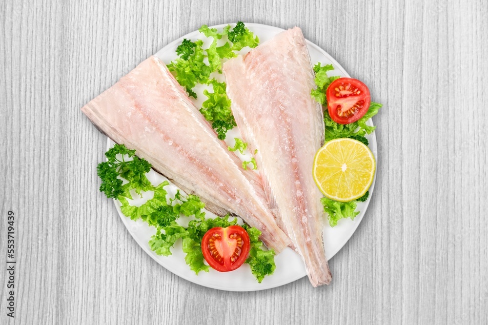 Tasty fresh fish vegetable salad in plate Tasty fresh fish vegetable salad in plate