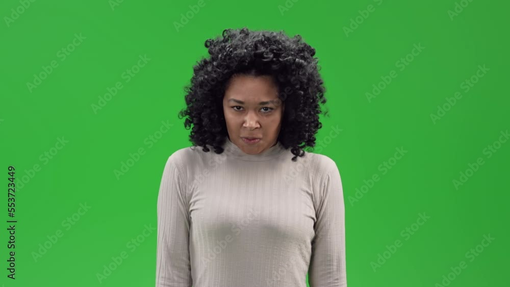 african american woman looking camera angry and grumpy Isolated on Green Screen african american woman looking camera angry and grumpy Isolated on Green Screen