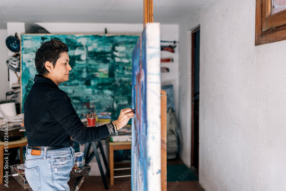 Female Painter in Home Art Studio