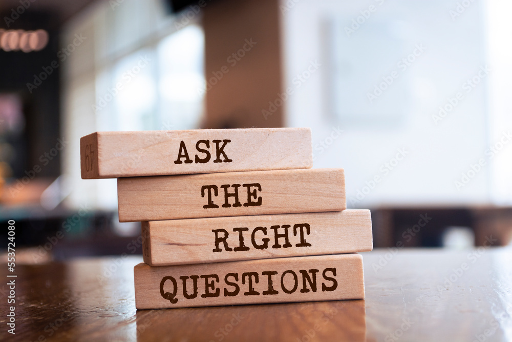 Wooden blocks with words 'Ask The Right Questions'. Wooden blocks with words 'Ask The Right Questions'.