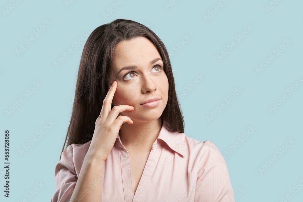 Confused young woman think have idea Confused young woman think have idea