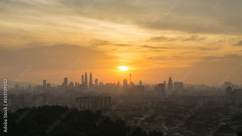 Aerial Time lapse: Kuala Lumpur city skyline view during sunset with busy city streets from afar at dusk in Malaysia. Prores 4KUHD Timelapse. Aerial Time lapse: Kuala Lumpur city skyline view during sunset with busy city streets from afar at dusk in Malaysia. Prores 4KUHD Timelapse.