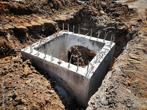 Concrete Drainage Pipe and manhole water system underground at construction site photo