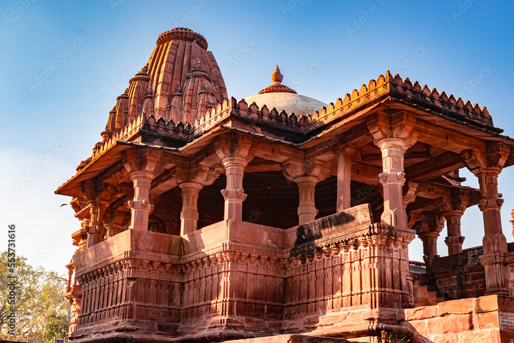 ancient hindu temple architecture with bright blue sky from unique angle at day