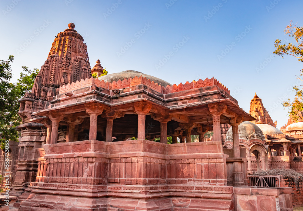 Fototapeta premium ancient hindu temple architecture with bright blue sky from unique angle at day