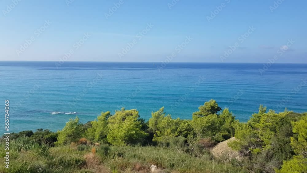 View from the top of the cliff on the endless blue ocean View from the top of the cliff on the endless blue ocean