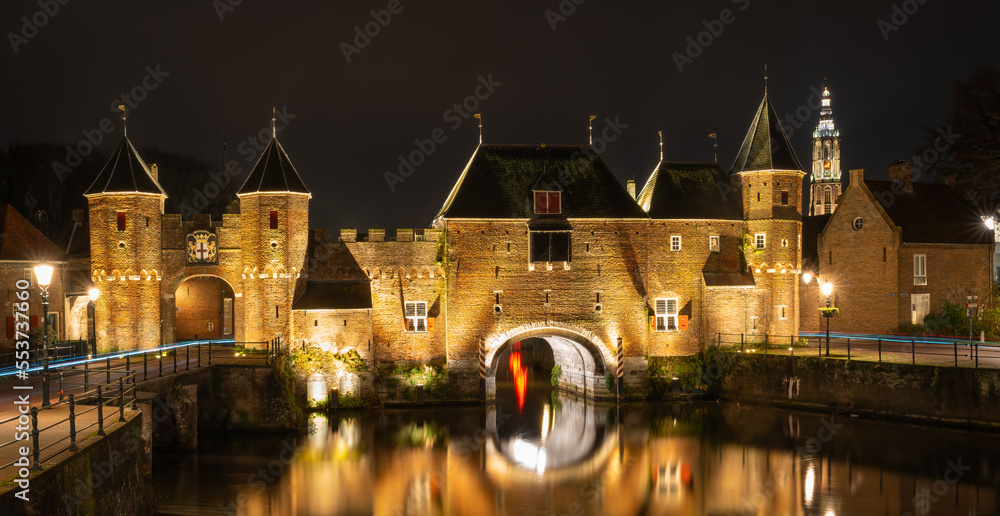 The Koppelpoort at night, medieval gate in dutch city of Amersfoort