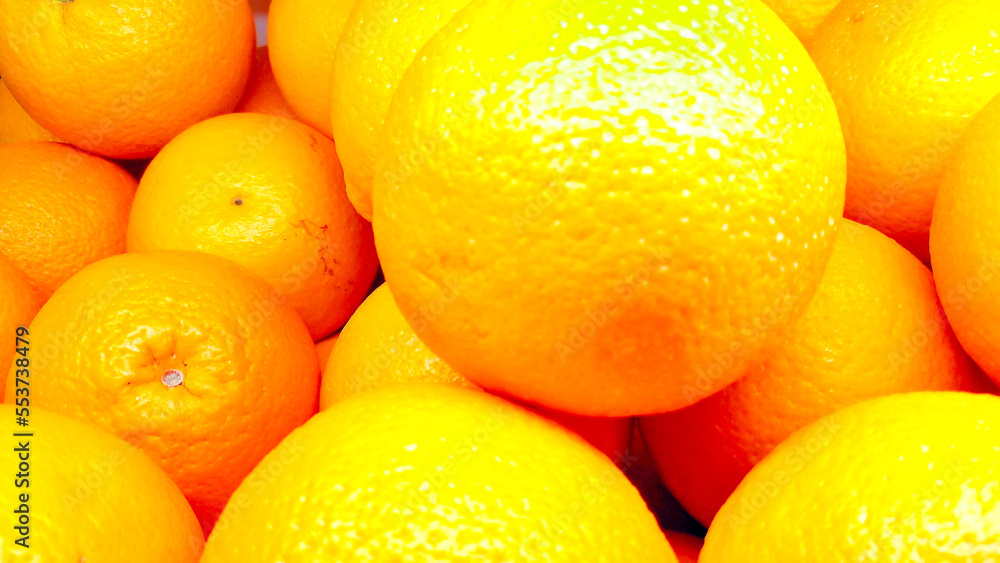 Orange fruit background. Close-up of oranges Orange fruit background. Close-up of oranges