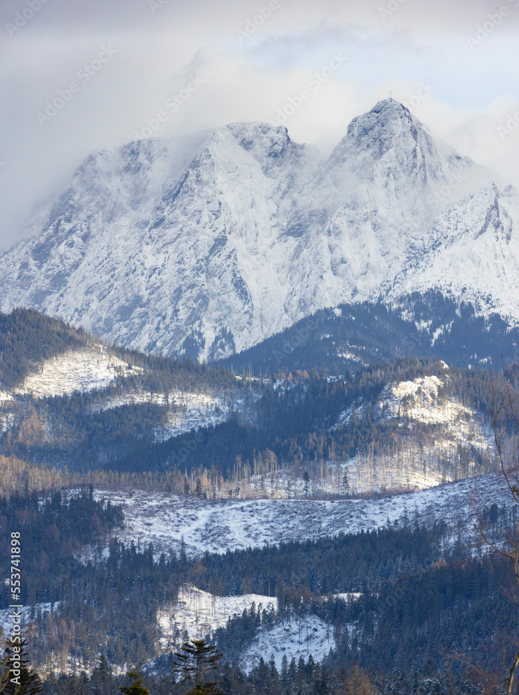 Wielki Giewont peak in winter mist, natural symbol of Poland, Europe