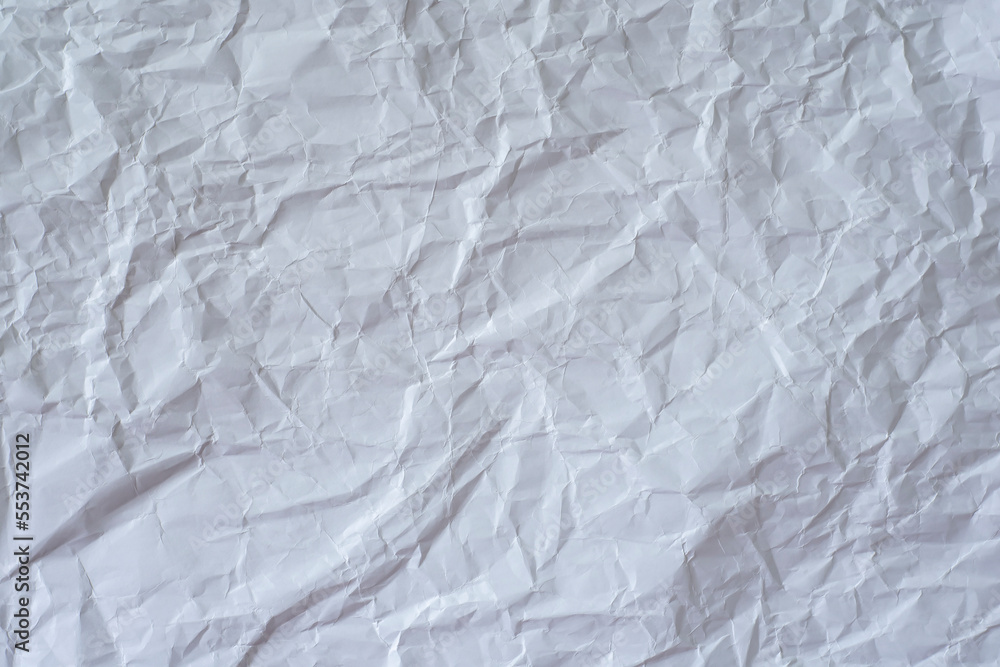 Crumpled white paper as a background. Crumpled white paper as a background.
