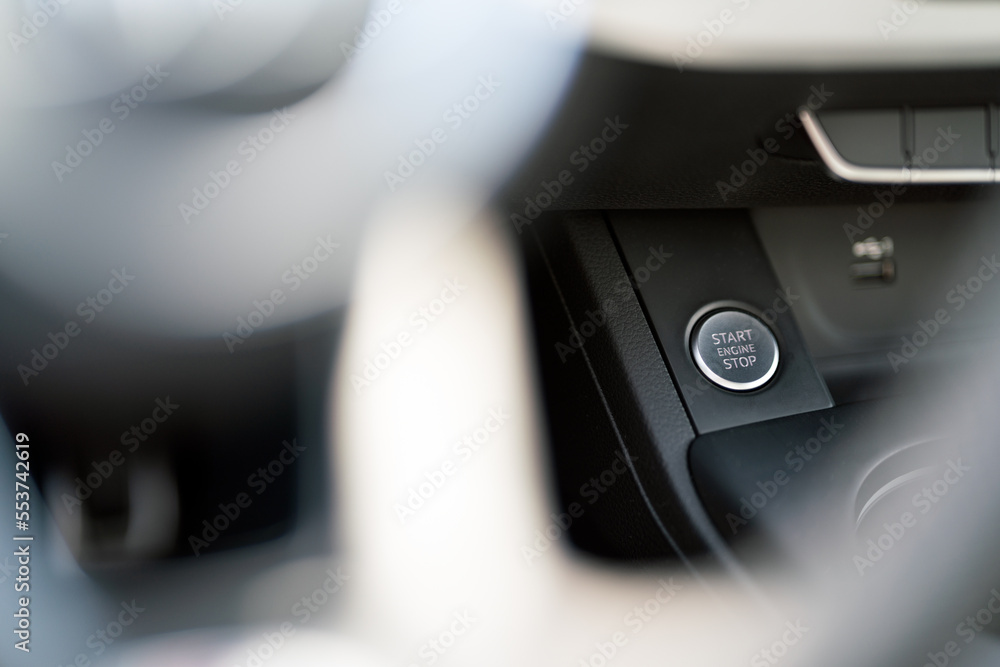 start engine stop button inside car. car interior and technology concept.