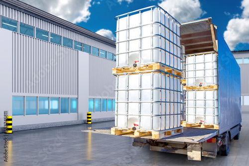 Truck with large containers for liquids. Truck near warehouse. Pallets with container for liquid. Plastic barrels in metal mesh. Concept of production of plastic containers for liquids. 3d image.