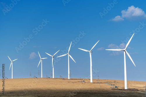 Wind turbines on autumn landsape