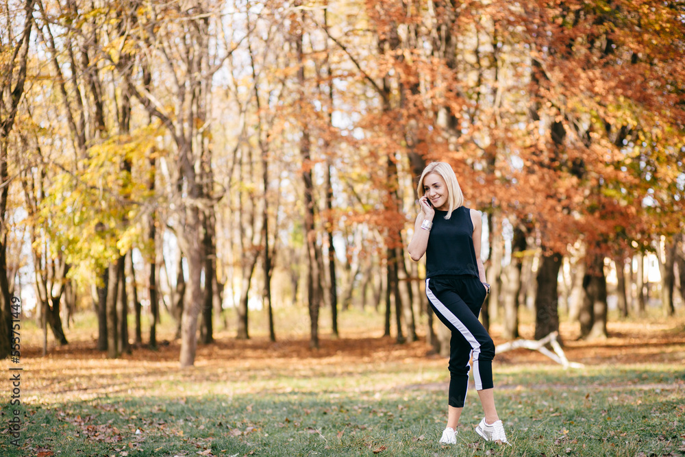 young girl walking in autumn park young girl walking in autumn park