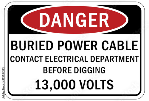 Buried cable warning sign and labels buried power cable contact electrical department before digging