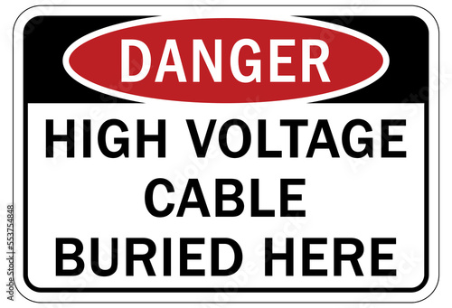 Buried cable warning sign and labels high voltage cable buried here