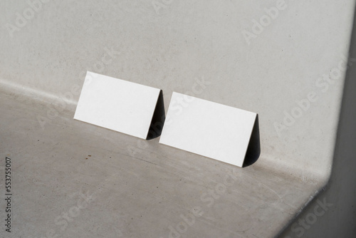 Blank business cards on a concrete background 