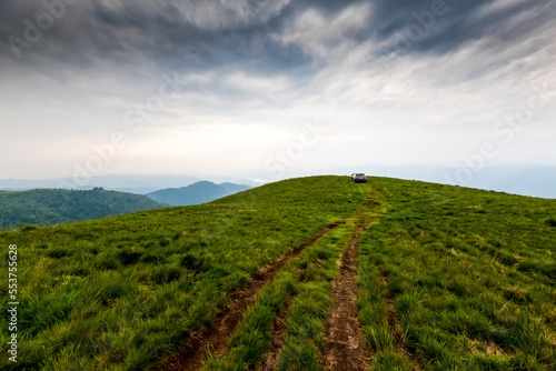 Wallpaper Mural Green hills and valleys in the Alps mountains in Italy Torontodigital.ca