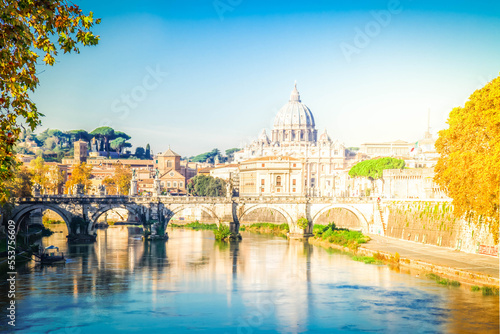St. Peter's cathedral over bridge and Tiber river in Rome at sunset, Italy © neirfy