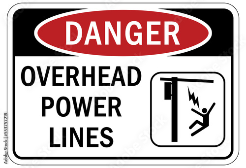 Overhead power lines sign and labels