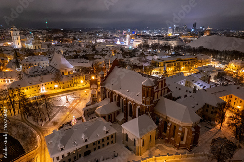 Aerial winter snowy night view of St. Anne s Church  Onos baznycia  Vilnius old town  Lithuania