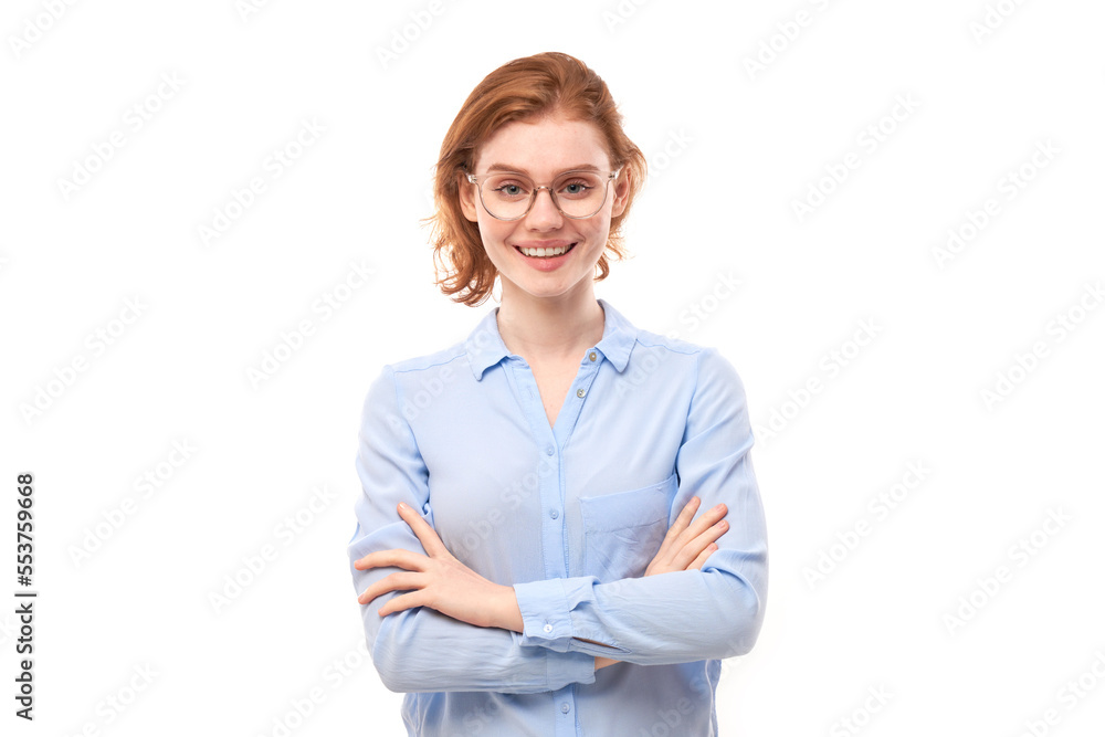 Portrait of attractive red-haired girl in business shirt and glasses smiling joyfully isolated on white studio background. Portrait of attractive red-haired girl in business shirt and glasses smiling joyfully isolated on white studio background.