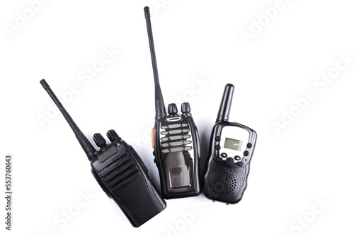 Black rectangle portable device with antenna isolated on white background. radio transceiver set for communication. radio set, walkie-talkie photo