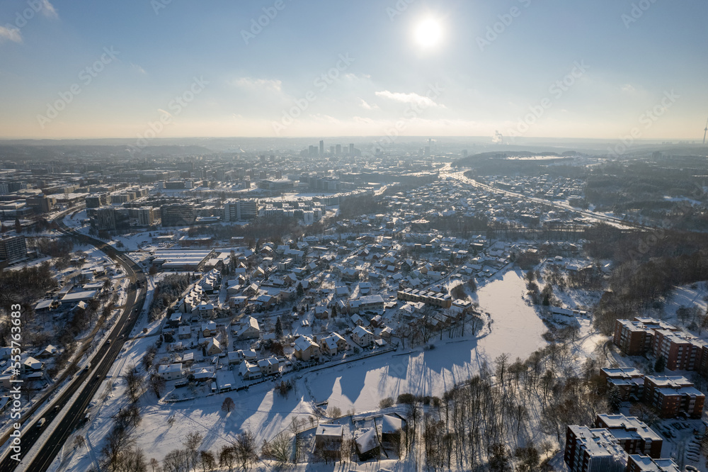 Aerial winter snowy day view of forest in Vilnius, Lithuania Aerial winter snowy day view of forest in Vilnius, Lithuania