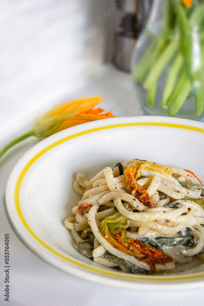 pasta with zucchinis flowers and cream sauce pasta with zucchinis flowers and cream sauce