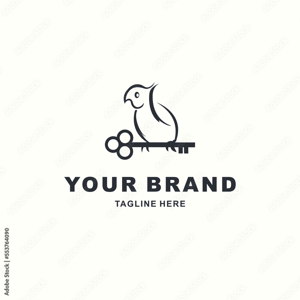 bird logo standing on a key bird logo standing on a key
