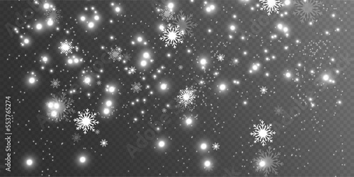 	
Snowfall. A lot of snow on a transparent background. Christmas winter background. Snowflakes falling from the sky.