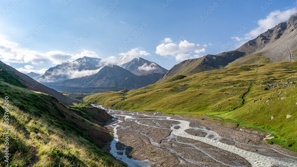 beautiful mountain gorge. panoramic view of the mountain peaks. morning in the mountains. mountain river beautiful mountain gorge. panoramic view of the mountain peaks. morning in the mountains. mountain river