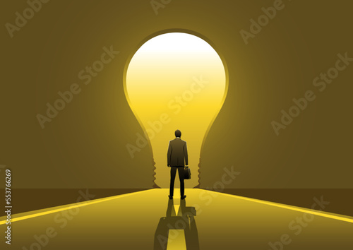 A businessman standing in front of bulb shape door