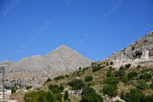 ancient town Sagalassos with clear blue sky and mountains on background 