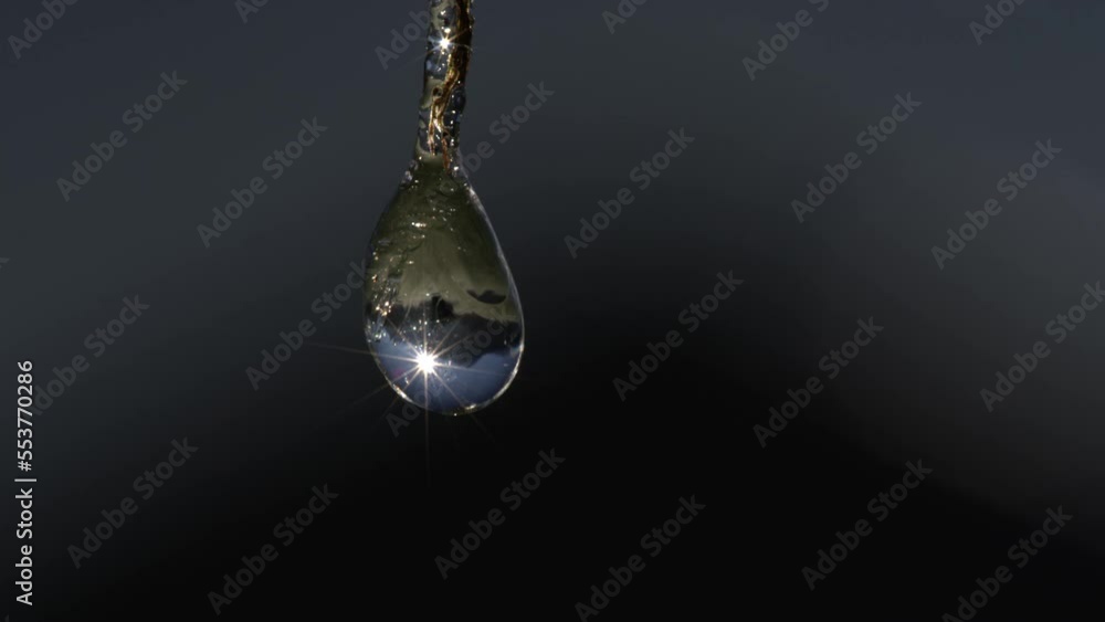 frozen raindrop reflecting sun 01 frozen raindrop reflecting sun 01