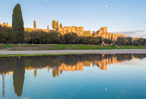Rome (Italy) - The Tiber river and the monumental Lungotevere street in the metropolitan capital of Italy. Here in particular the Circo Massimo roman stadium with Foro Romano ruins.