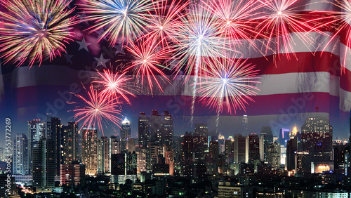 Amazing beautiful colorful fireworks display on celebration night, showing on the city night background 