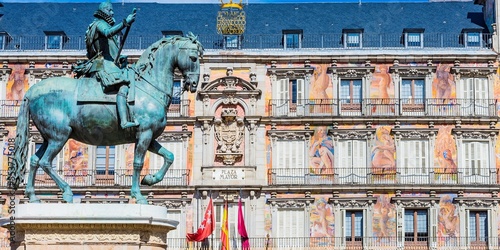 Equestrian statue of Felipe III, in the background, the Casa de la Panaderia. The Plaza Mayor, Main Square. Madrid, Comunidad de madrid, Spain, Europe photo