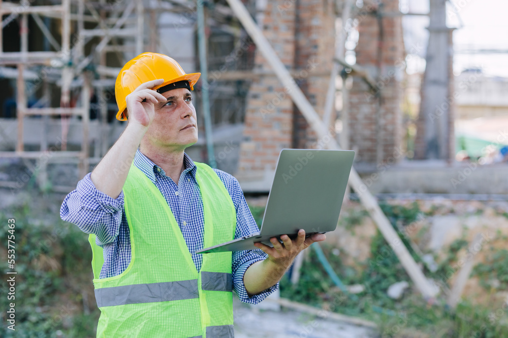 American engineer builder work in construction site. Professional foreman worker project designer leader male. American engineer builder work in construction site. Professional foreman worker project designer leader male.