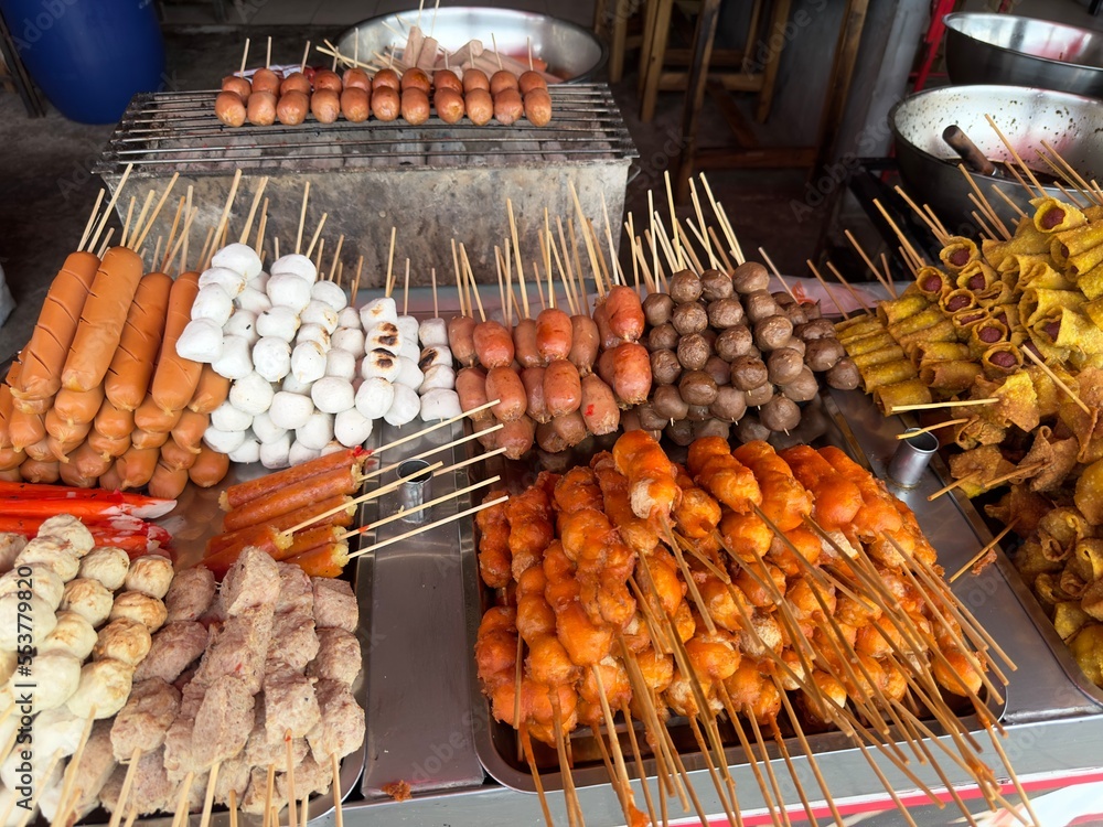 Asian fast junk food at Thailand street. Balls from meat, fish, sea food