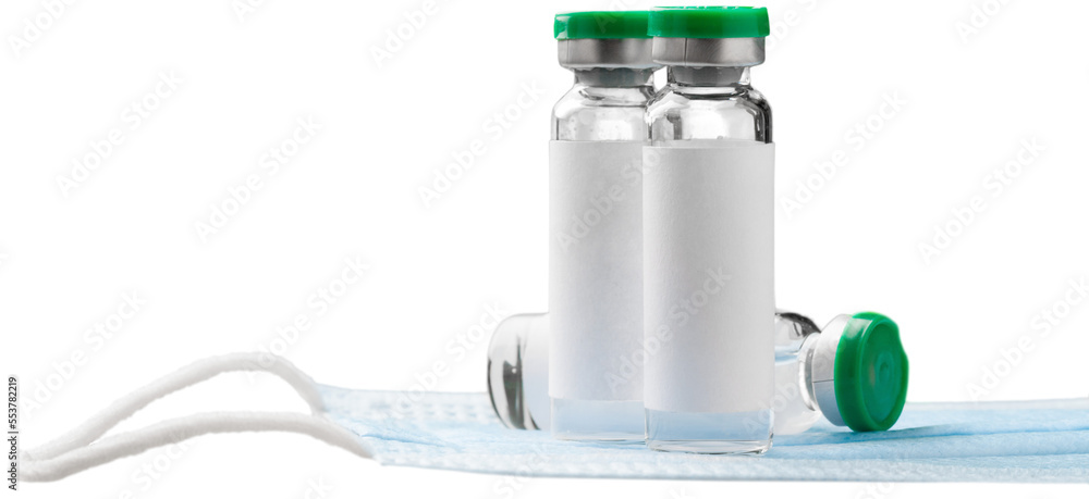 Covid-19 vaccine bottle with a blue liquid and taking the vaccine from it with a syringe Covid-19 vaccine bottle with a blue liquid and taking the vaccine from it with a syringe